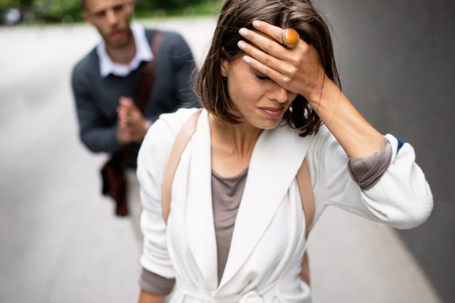 breakup of couple with man and sad girlfriend outd 3UKA9S9
